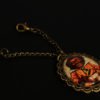 Vintage puppet pendant for noddders headphones