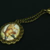 Vintage cat pendant for Noddders headphones